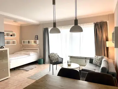 Ein Bett oder Betten in einem Zimmer der Unterkunft Bellevue 16 KaMare - direkte Strandlage