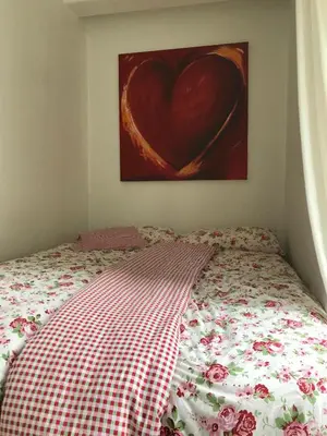 Ein Bett oder Betten in einem Zimmer der Unterkunft Ferienwohnung- nur 60 Meter vom Strand