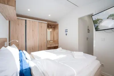 Ein Bett oder Betten in einem Zimmer der Unterkunft Ostseecamp Lübecker Bucht Haus 