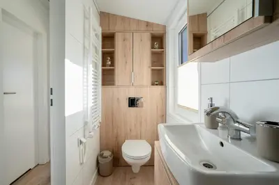 Ein Badezimmer in der Unterkunft Ostseecamp Lübecker Bucht Haus 