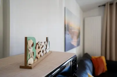 Ein Bett oder Betten in einem Zimmer der Unterkunft Ostseecamp Lübecker Bucht Haus 