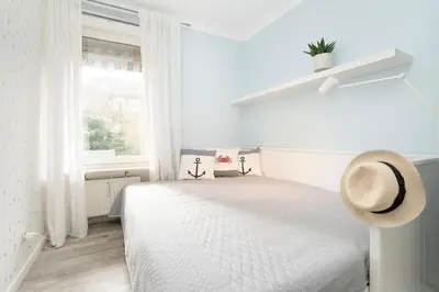 Ein Bett oder Betten in einem Zimmer der Unterkunft Beachtime