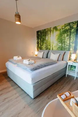 Ein Bett oder Betten in einem Zimmer der Unterkunft Tien Stuuv