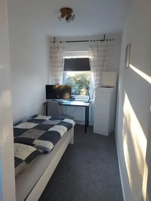 Ein Bett oder Betten in einem Zimmer der Unterkunft Ferienhaus Cissy