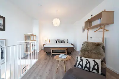 Ein Bett oder Betten in einem Zimmer der Unterkunft Große Freiheit App 15