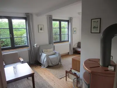 Ein Sitzbereich in der Unterkunft NEU! Ferienhaus mit Naturgarten