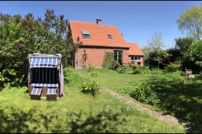 Ein Garten an der Unterkunft NEU! Ferienhaus mit Naturgarten