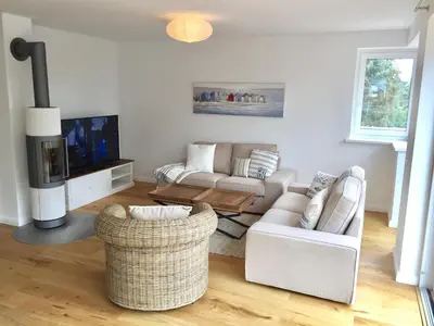 Ein Sitzbereich in der Unterkunft Maison du Port