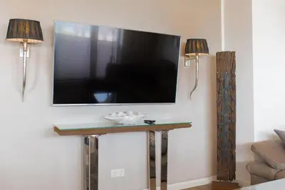 TV/Unterhaltungsangebot in der Unterkunft Ferienwohnung Aalkate App 2