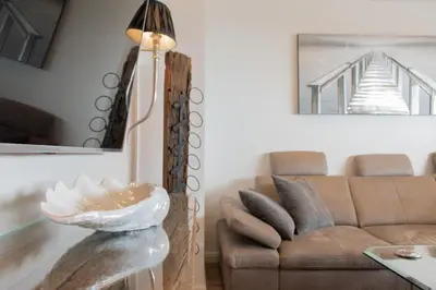 Ein Sitzbereich in der Unterkunft Ferienwohnung Aalkate App 2