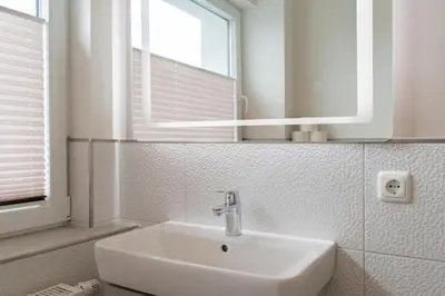Ein Badezimmer in der Unterkunft Ferienwohnung Aalkate App 2