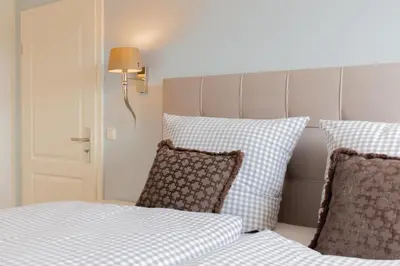 Ein Bett oder Betten in einem Zimmer der Unterkunft Ferienwohnung Aalkate App 2
