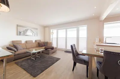 Ein Sitzbereich in der Unterkunft Ferienwohnung Aalkate App 2