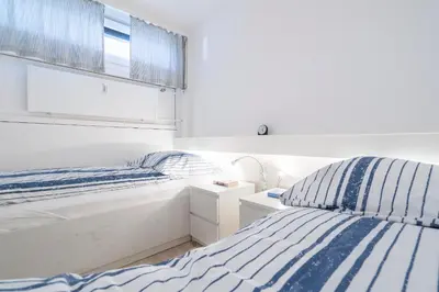 Ein Bett oder Betten in einem Zimmer der Unterkunft Ferienpark Sierksdorf App 51 - Strandlage