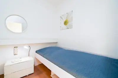 Ein Bett oder Betten in einem Zimmer der Unterkunft Ferienpark Sierksdorf App 98 - Strandlage