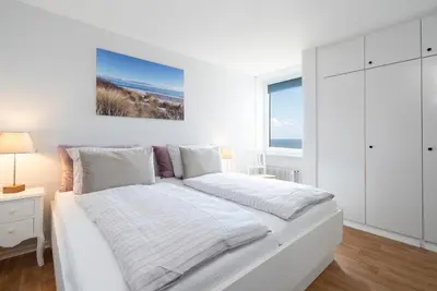 Ein Bett oder Betten in einem Zimmer der Unterkunft Ferienpark Sierksdorf App 322 - Strandlage