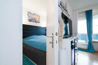 Ein Bett oder Betten in einem Zimmer der Unterkunft Panoramic App A02-9 Schick-Lounge