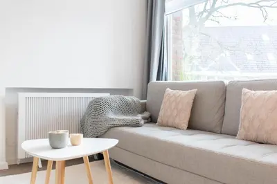 Ein Sitzbereich in der Unterkunft Ferienwohnung Die Hanse 12