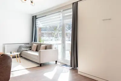 Ein Sitzbereich in der Unterkunft Ferienwohnung Die Hanse 12