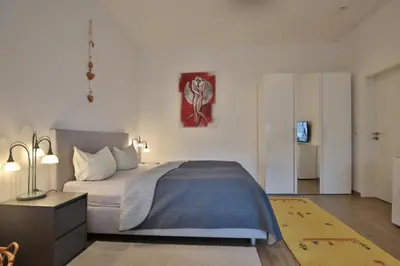 Ein Bett oder Betten in einem Zimmer der Unterkunft Hannas Strandhaus App A