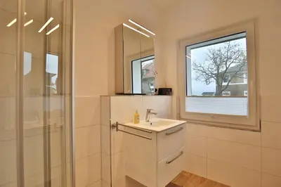 Ein Badezimmer in der Unterkunft Hannas Strandhaus App A