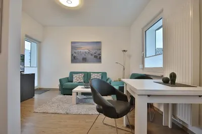 Ein Sitzbereich in der Unterkunft Hannas Strandhaus App B