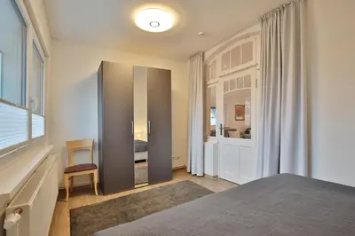 Ein Bett oder Betten in einem Zimmer der Unterkunft Hannas Strandhaus App C