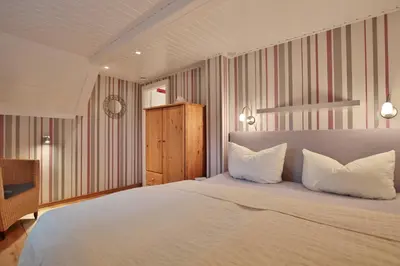Ein Bett oder Betten in einem Zimmer der Unterkunft Hannas Strandhaus Hannas Strandhaus App D