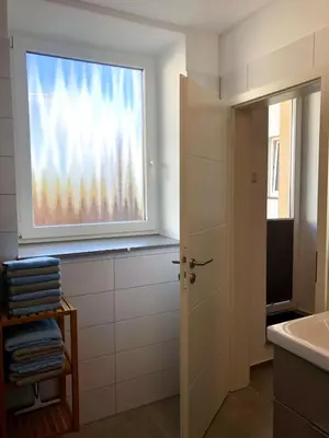 Ein Badezimmer in der Unterkunft Erdgeschoss-Appartement mit Seeterasse
