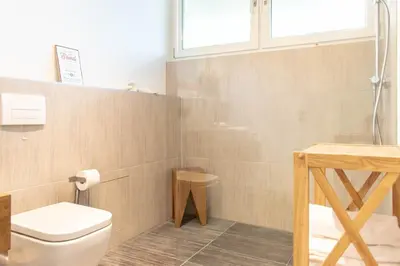 Ein Badezimmer in der Unterkunft Ferienwohnung 54 Grad Nord App 8
