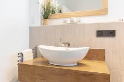 Ein Badezimmer in der Unterkunft Ferienwohnung 54 Grad Nord App 8