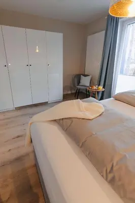 Ein Bett oder Betten in einem Zimmer der Unterkunft Holt Stuuv