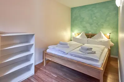 Ein Bett oder Betten in einem Zimmer der Unterkunft Strandresidenz Timmendorfer Strand Apartment 215