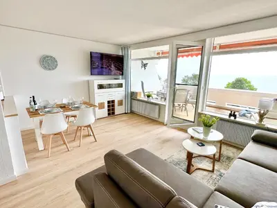 Ein Sitzbereich in der Unterkunft Ferienpark Sierksdorf App 193 - Strandlage Strandkorb