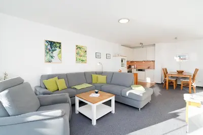 Ein Sitzbereich in der Unterkunft Strandresidenz Sierksdorf Nr 03