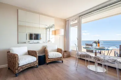 Ein Sitzbereich in der Unterkunft Meerblick Apartment 110