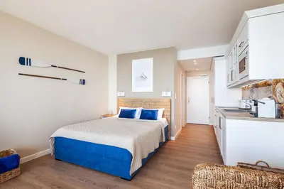 Ein Bett oder Betten in einem Zimmer der Unterkunft Meerblick Apartment 110