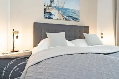 Ein Bett oder Betten in einem Zimmer der Unterkunft View 91 Strandliebe