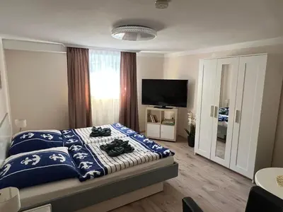 Ein Bett oder Betten in einem Zimmer der Unterkunft Ferienwohnung Liss
