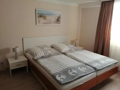 Ein Bett oder Betten in einem Zimmer der Unterkunft Ferienwohnung Liss