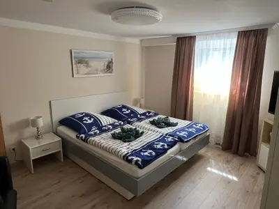 Ein Bett oder Betten in einem Zimmer der Unterkunft Ferienwohnung Liss