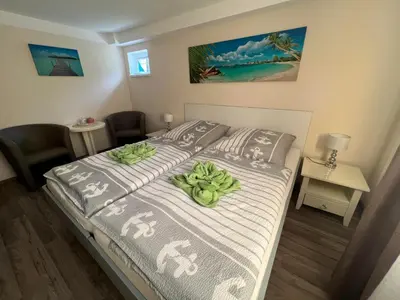 Ein Bett oder Betten in einem Zimmer der Unterkunft Ferienwohnung Liss
