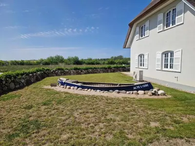 Ein Garten an der Unterkunft Neu! Strandnah XXL bis 12 Pers2Kinder Haus AB