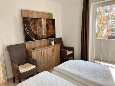 Ein Bett oder Betten in einem Zimmer der Unterkunft Wilhelm 7
