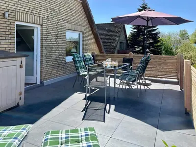 Ein Balkon oder eine Terrasse in der Unterkunft Haus Strandwinkel Ferienwohnung 