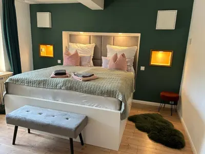 Ein Bett oder Betten in einem Zimmer der Unterkunft Appartement fliegender Hirsch