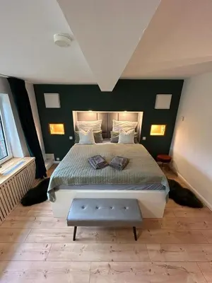 Ein Bett oder Betten in einem Zimmer der Unterkunft Appartement fliegender Hirsch