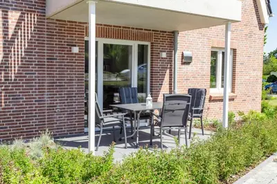 Ein Garten an der Unterkunft Villa Dornkamp 1