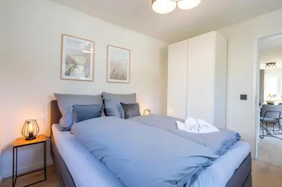 Ein Bett oder Betten in einem Zimmer der Unterkunft Villa Dornkamp 1
