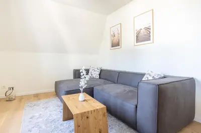 Ein Sitzbereich in der Unterkunft Villa Dornkamp 4